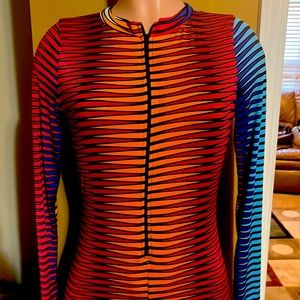 Multi-colored body suit. Large in size. Nice fit.